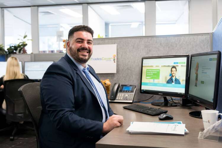 Trade insurance expert sitting at a desk