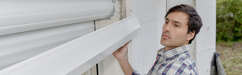 Installing window shutter and architecture Security Door and Shutter Installers Public Liability Insurance