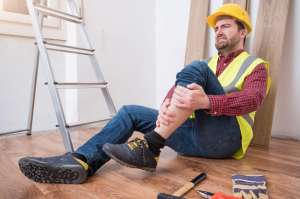 An injured carpenter at work.