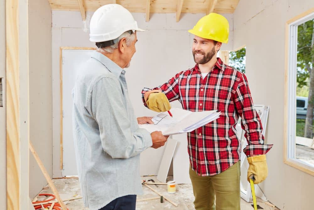 Tradesman discussing with client.